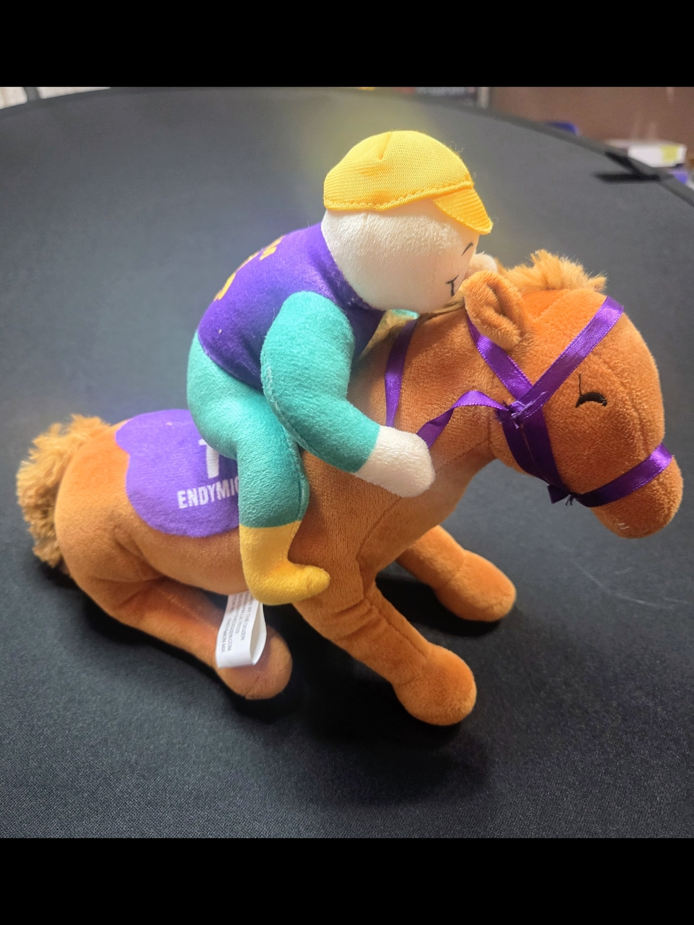 Plush Jockey Riding Orange Horse Toy with Purple Accents